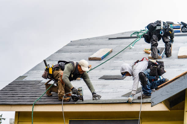 Professional Gutter Installation technician working in Seaside, CA